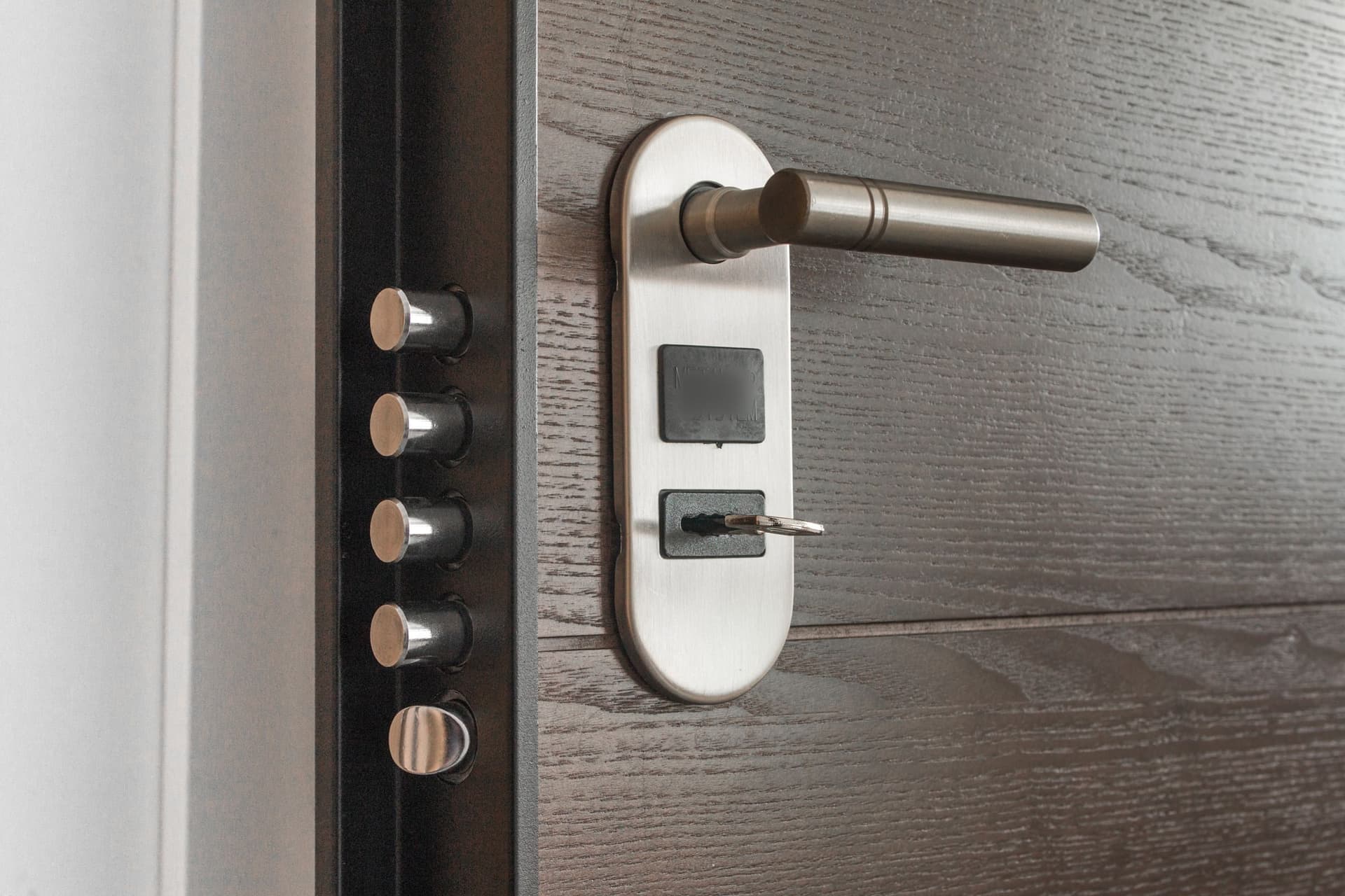 Key in the lock of a multi-point security door.